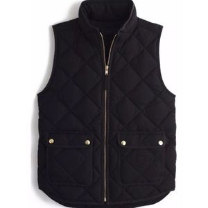 Black JCrew vest with gold zipper and buttons